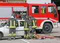 Italian firefighters relieve an injured after a road accident