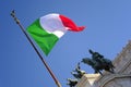 Italian flag, blue sky, architecture