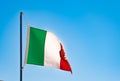 Italian flag on a blue sky, problems, ilaty recession concept, Bandiera d\'Italia, flutter flag Italy