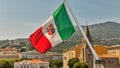 Italian flag with Bastia cityscape. Corsica, France Royalty Free Stock Photo