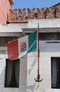Italian flag with the symbols of the Italian maritime republics