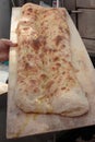 Italian Flat Bread with Oil on Wooden Board