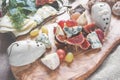 Italian Focaccia bread with cheese and a cheese plate with figs and Gorgonzola, brie, DorBlu and grapes. Royalty Free Stock Photo