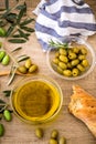 Italian food background with ciabatta bread, olive oil and olive