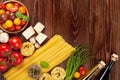 Italian food cooking ingredients. Pasta, tomatoes, basil Royalty Free Stock Photo