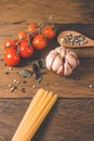 Italian food cooking ingredients. Pasta, vegetables, spices Royalty Free Stock Photo