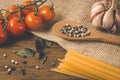 Italian food cooking ingredients. Pasta, vegetables, spices Royalty Free Stock Photo