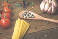 Italian food cooking ingredients. Pasta, vegetables, spices Royalty Free Stock Photo