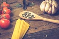 Italian food cooking ingredients. Pasta, vegetables, spices Royalty Free Stock Photo