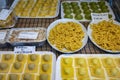 Italian food, fresh home made stuffed pasta tortelli or ravioli dumplings ready to cook, Parma, Emilia Romagna, Italy. Italian Royalty Free Stock Photo