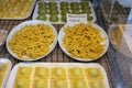 Italian food, fresh home made stuffed pasta tortelli or ravioli dumplings ready to cook, Parma, Emilia Romagna, Italy. Italian Royalty Free Stock Photo