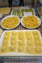 Italian food, fresh home made stuffed pasta tortelli or ravioli dumplings ready to cook, Parma, Emilia Romagna, Italy. Italian Royalty Free Stock Photo