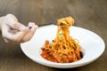 Italian food hand holding fork with spaghetti bolognese in white Royalty Free Stock Photo