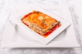 Italian Food. Hot tasty Classic Lasagna with bolognese sauce on white plate. Royalty Free Stock Photo