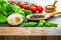 Italian food ingredients. Herbs and seasoning spices blurred in the background