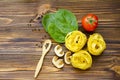 Italian food ingredients: pasta, tomato, spinach, pepper, porcini on wooden background Royalty Free Stock Photo