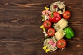 Italian Food Pasta Ingredients on Wooden Table Top View Pasta Background Variety of Pasta and Vegetables Flat Lay Copy Space Royalty Free Stock Photo