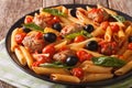 Italian Food: Pasta with meatballs, olives and tomato sauce closeup. horizontal Royalty Free Stock Photo