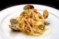Italian food recipes, linguine pasta with clams and tomato sauce Royalty Free Stock Photo