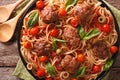 Italian food: spaghetti with meatballs and tomato sauce closeup