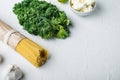 Italian food. Vegetables, olive oil, herbs and pasta, on white background , with copyspace  and space for text Royalty Free Stock Photo