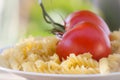 Italian fusilli pasta with tomatoes Royalty Free Stock Photo