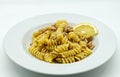 Italian Fusilli Pasta with tuna and lemon in a white dish Royalty Free Stock Photo