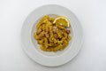 Italian Fusilli Pasta with tuna and lemon in a white dish Royalty Free Stock Photo