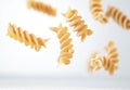 Italian fusilli pasta on white background