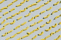 Italian fusilli, rotini or scroodle macaroni pasta food background texture. Top view, pasta spirals on gray background Royalty Free Stock Photo