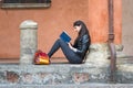 Italian girl reads a book