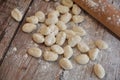 Italian gnocchi fresh pasta homemade on wooden table