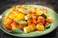 Italian gnocchi with tomato sauce and zucchini