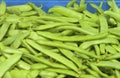 Italian Green Romano Beans in bin on display for sale in Farmers Market. Grown in Portland, Oregon, USA