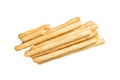 Italian grissini or salted bread sticks on wooden board. Isolated on white background Royalty Free Stock Photo