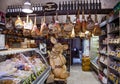 Italian grocery store with hamon or jamon, mixed cheeses and wine Royalty Free Stock Photo