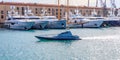 Italian Guardia di Finanza speed boat in the fair harbor in Genoa