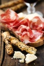 Italian ham with breadsticks Royalty Free Stock Photo