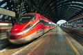 Italian high-speed train Trenitalia Frecciarossa stop at the Central Station of Milan, Italy
