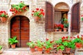 Italian home with colorful flowers Royalty Free Stock Photo