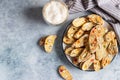 Italian homemade biscotti or cantuccini with almond and dry fruits and a cup of coffee. Traditional double baked cookies. Top view Royalty Free Stock Photo