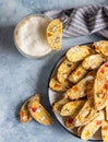 Italian homemade biscotti or cantuccini with almond and dry fruits and a cup of coffee. Traditional double baked cookies. Top view Royalty Free Stock Photo