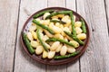 Italian homemade potatoes gnocchi with asparagus