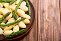 Italian homemade potatoes gnocchi with asparagus