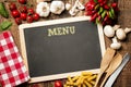 Italian Ingredients for pasta on Chalk Menu Board. Royalty Free Stock Photo