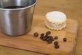 Italian lack coffee in a cup with coffee beans and a handmade cookie with sugar and a moka pot behind. Everything in vintage brown Royalty Free Stock Photo