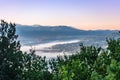 Italian Landscape on the Countryside with Fog at Sunrise in Basilicata, in the South of Italy Royalty Free Stock Photo