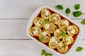 Italian lasagna portion roll ups in baking oven tray