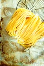 Italian linguine or tagliatelli pasta Royalty Free Stock Photo