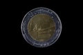 500 italian lira coin from 1987 isolated on black Royalty Free Stock Photo